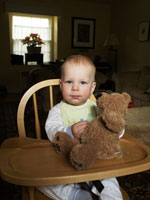 Nick Kelsh photo of baby in highchair