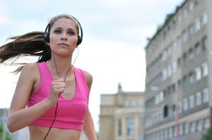 Running Headphones on Woman Running W  Headphones