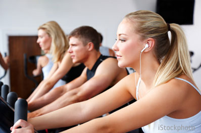 woman wearing in-ear headphones