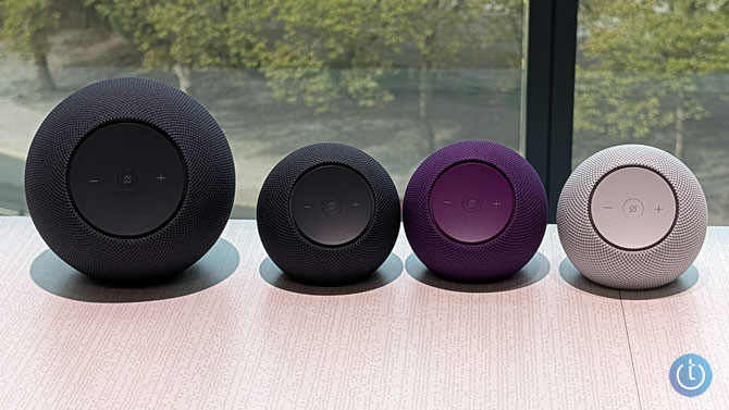 Amazon Echo Studio on the left, Amazon Echo Dot Max in black, purple, and white on the right