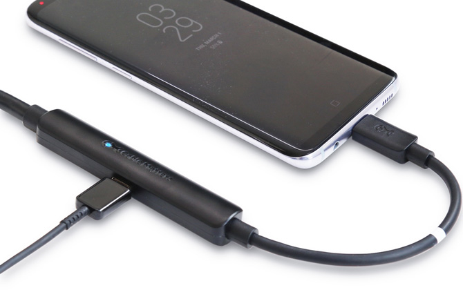 Cable Matters HDMI cable with power passthrough plugged into Android phone and a power cable.
