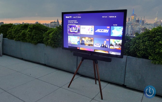 Element Patio Series Roku TV on roof deck at sunset with the New York skyline in the background.