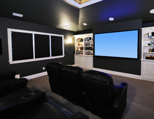 home theater set-up with blackout shades