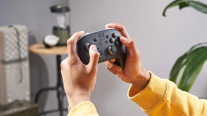 Nintendo Switch 2 Pro Controller shown in a person's hands for scale
