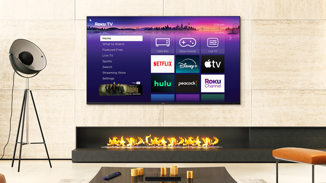 Roku Pro Series TV shown hanging on the wall.