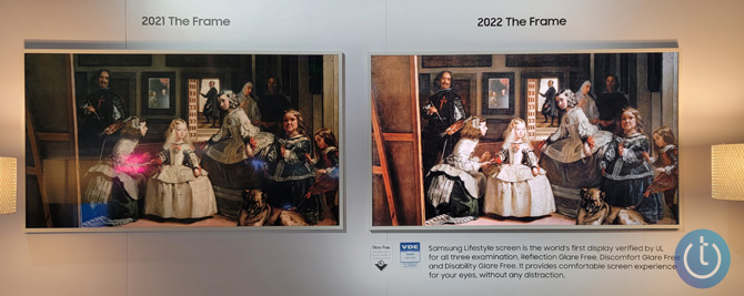 Samsung The Frame 2021 model showing a painting on the left and you can see a pink reflection. On the right you see the same painting on the 2022 The Frame with no reflection and more texture.