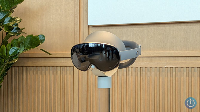 Samsung's Galaxy XR glasses are mounted on a stand.