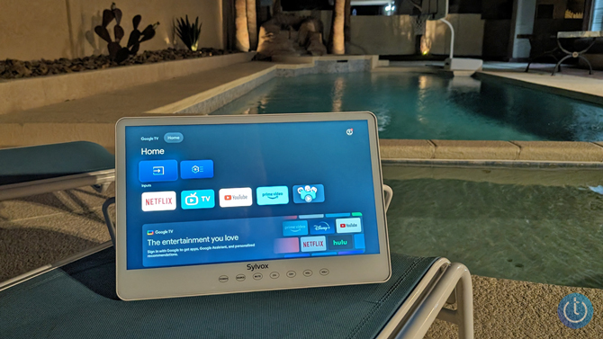 Sylvox Portable Waterproof Smart TV shown poolside.