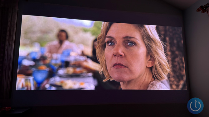 The Xgimi Horizon Max projects onto a blue wall