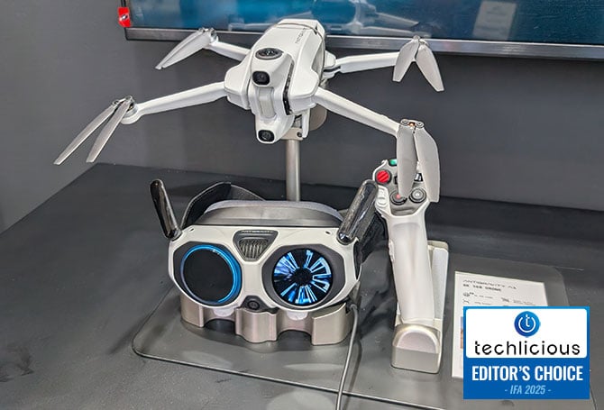 The Antigravity A1 drone is shown with its googles and controller. The Techlicious Editor's Choice Award logo is in the lower right.