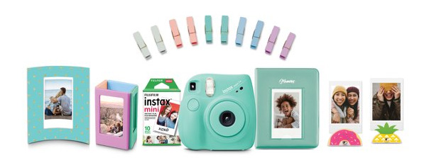 Fujifilm Instax Mini 7+ in green with, Instax Mini film, a magnetic frame, a curved frame, a photo album, photo-hanging pegs