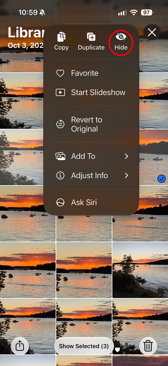 Three photos selected in the iPhone Photos app, with the Hide menu option circled in red.