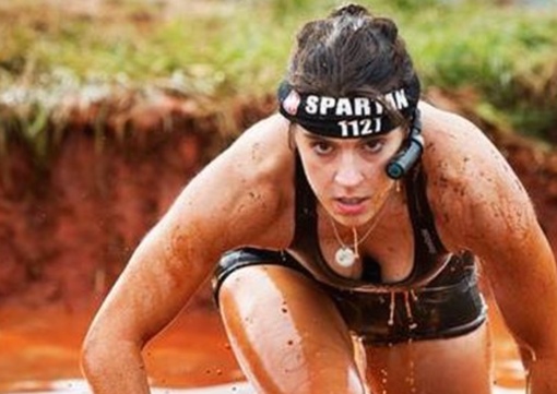 Woman wearing Panasonic A1 HD Action Cam during obstacle race