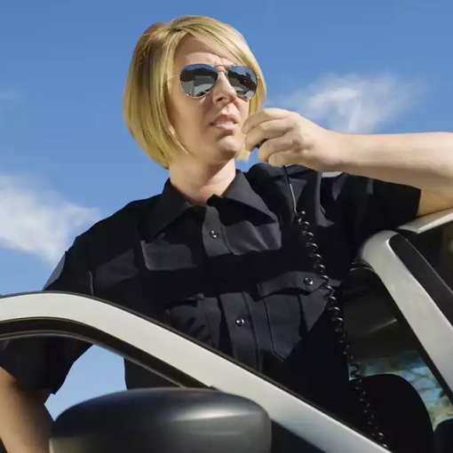 Policewoman using radio