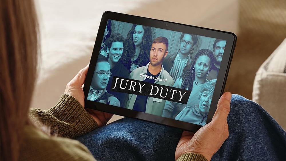 Amazon Fire HD 10 tablet with a video on the screen