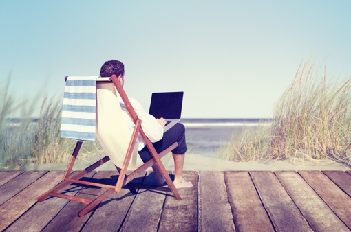 Businessman working on a dock