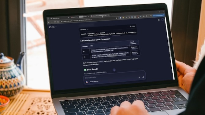Someone working on a laptop that shows the Microsoft Copilot screen