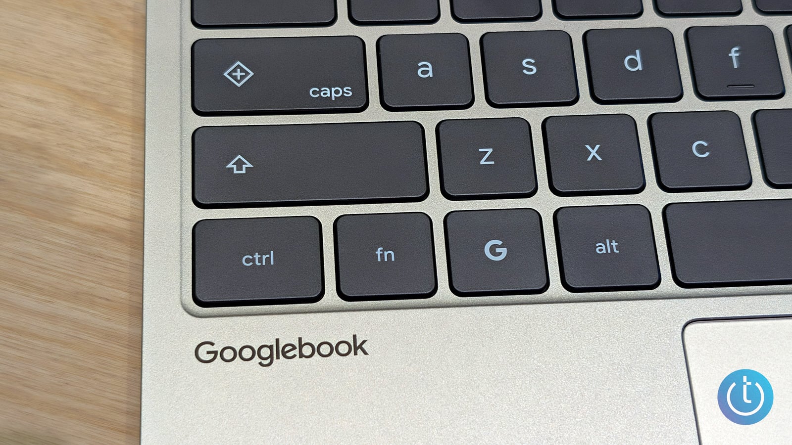 Close-up shot of Googlebook keyboard showing the Googlebook logo