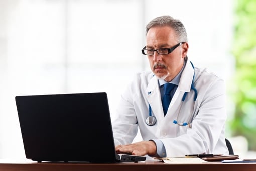 Doctor using a computer