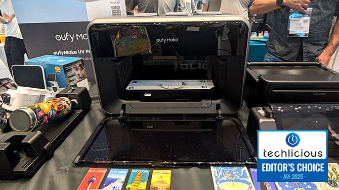 eufyMake UV Printer E1 with some print sample in front of it. The Techlicious Editor's Choice Award logo is in the lower right. 