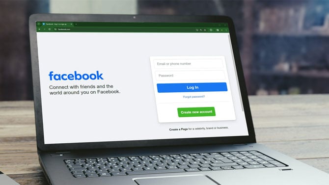 Laptop showing the Facebook login screen.