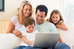 family with laptop