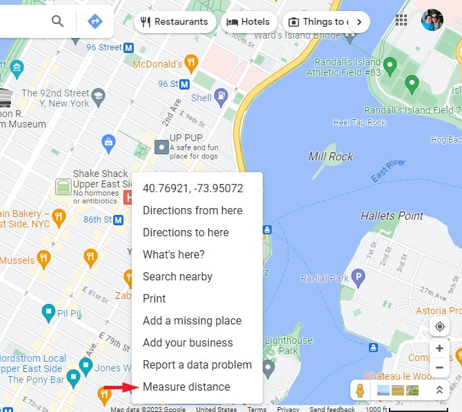 Screenshot of Google Maps in the desktop Chrome browser showing the right-click menu with the Measure distance option pointed out.