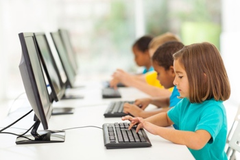 Grade school students using computers