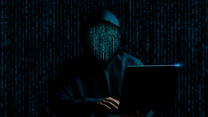 A concept drawing of a hacker made of code holding a laptop computer.