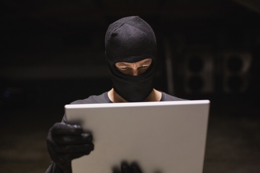 Hacker using a laptop