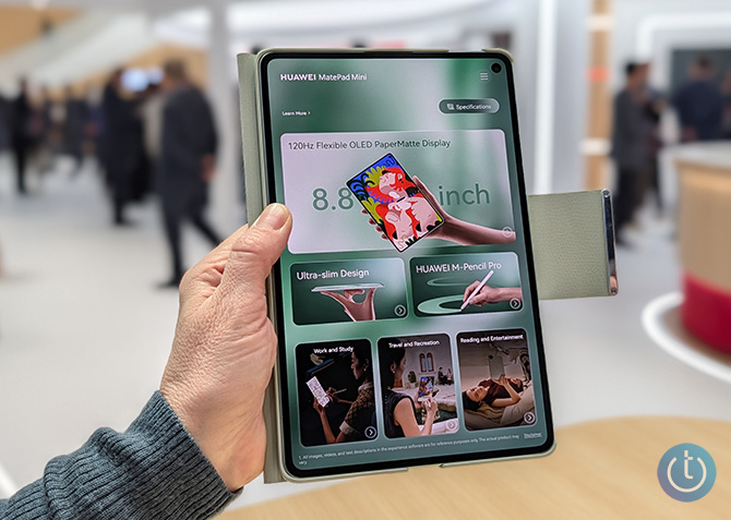 Huawei MatePad Mini shown in a hand for scale