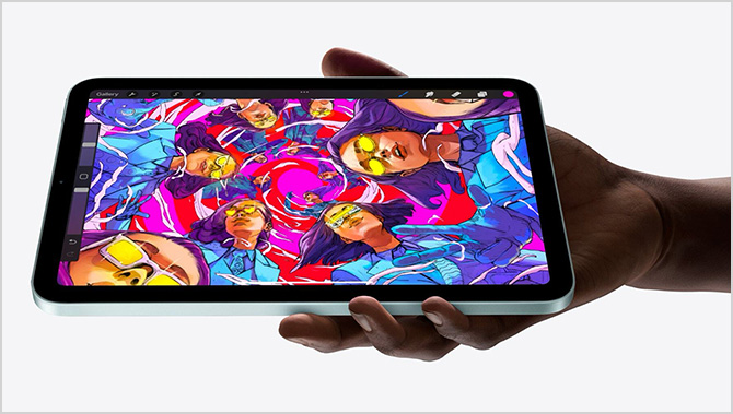 Hand holding Apple iPad mini with A17 Pro chip