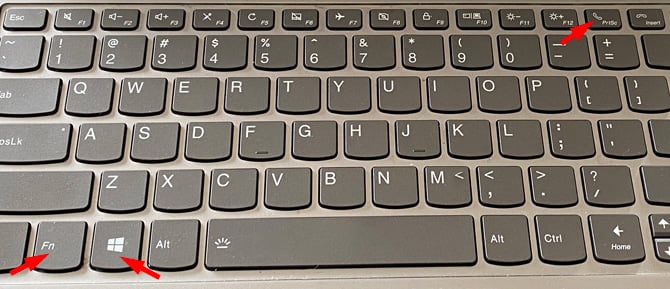 Computer keyboard with Windows, Fn, and PrtScr keys identified with arrows