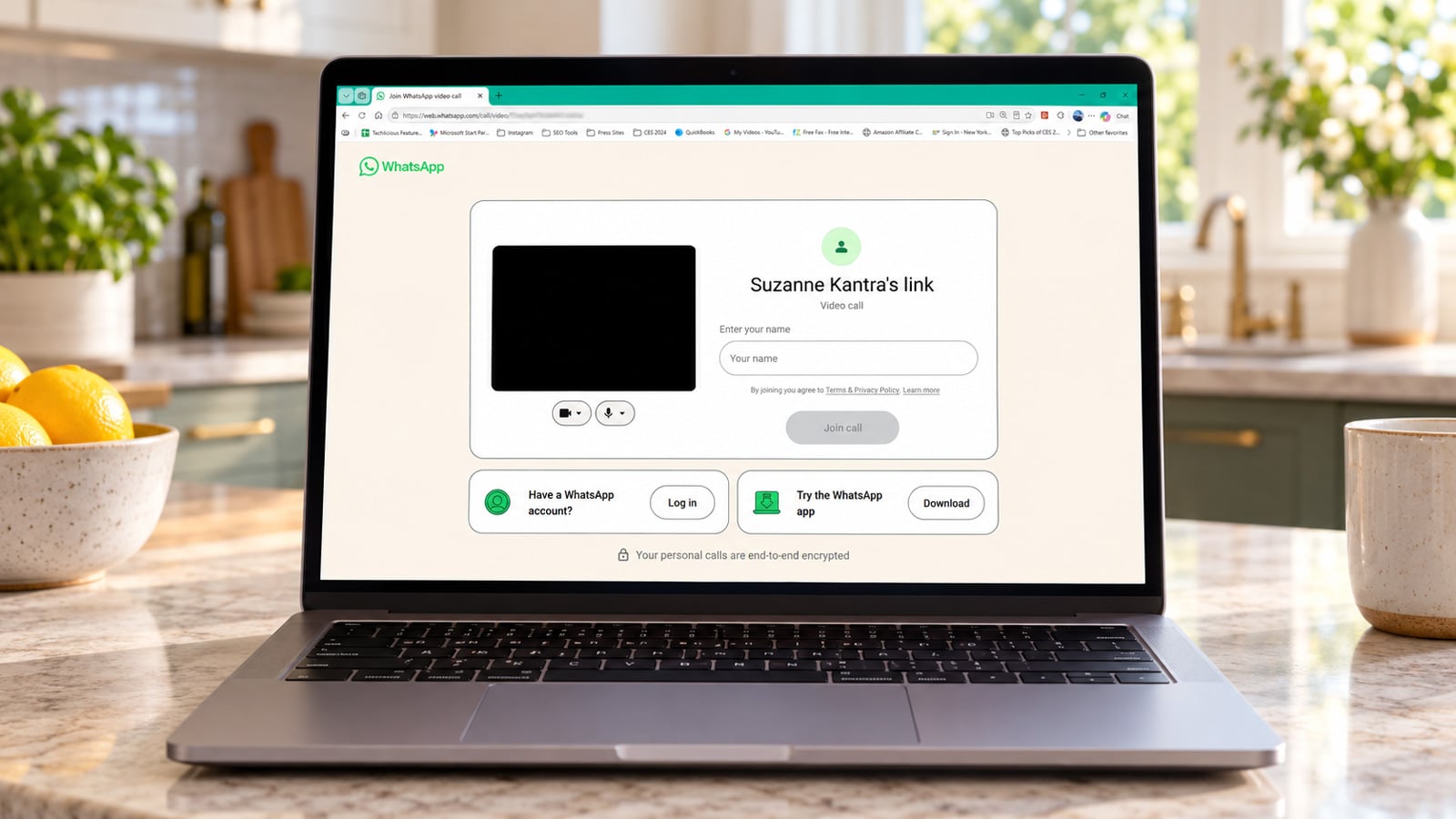 Laptop on a kitchen counter displaying a WhatsApp video call invitation with a name field and Join call button.