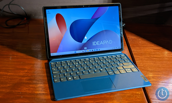 Lenovo IdeaPad Duet 3i shown from the front on a table with the keyboard folio case.