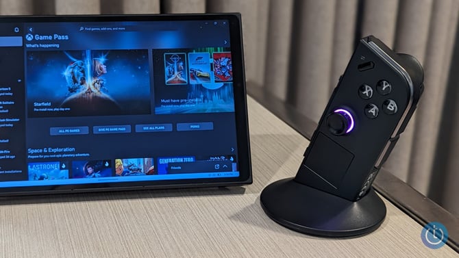 Lenovo Legion Go shown with the right controller in the base acting as a mouse.