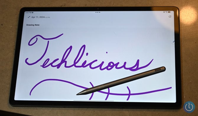 Lenovo Tab P12 shown with its pen and a note taking app.