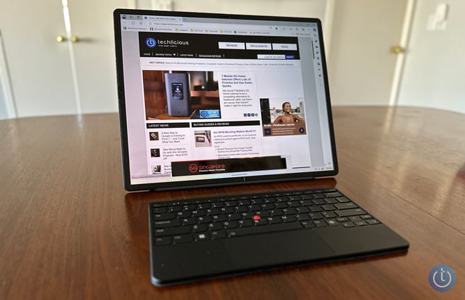 Lenovo X1 Fold 16 shown in all-in-one mode with the Bluetooth keyboard.