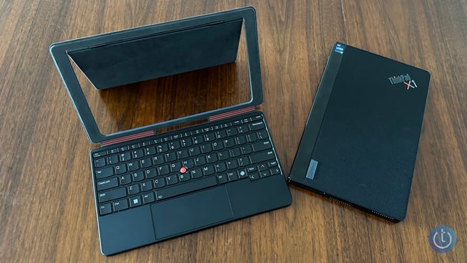 Lenovo ThinkPad Fold X1 shown next to the optional Bluetooth keyboard Folio case.