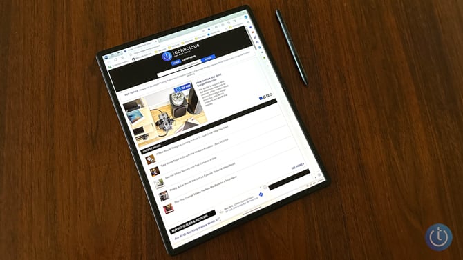 Lenovo ThinkPad X1 Fold 16 shown as a tablet with the Lenovo Precision Pen 2.