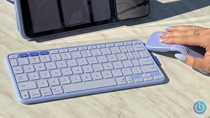 The Logitech Mobi Fold in Lilac is shown with the matching Lilac Logitech Keys-2-Go keyboard.