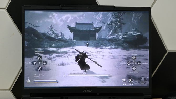 MSI Raider 16 Max with Black Myth: Wukong gameplay on the display