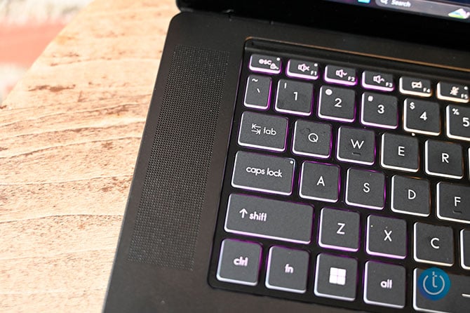 Closeup of large MSI Stealth 16 AI+ speaker next to keyboard