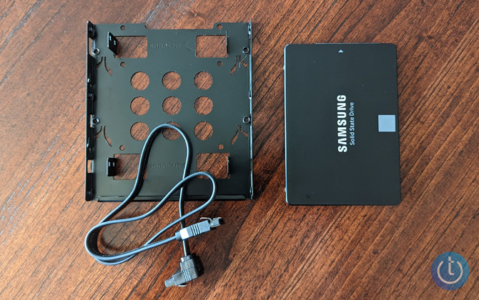 Samsung SSD, mounting adapter, and SATA cable