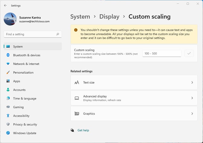 Screenshot of Windows 11 Display settings showing the Custom scaling option. You see a warning to not change the settings unless you need to. 