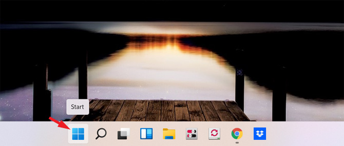 Screenshot of home screen for Windows 11 with Start Button pointed out in the far left of the task bar.