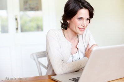 woman looking at computer