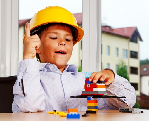 Child building a LEGO set