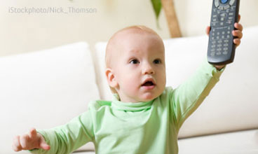 Baby holding remote