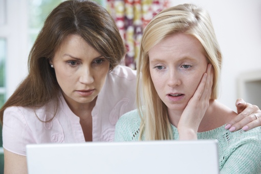 Concerned mother and daughter